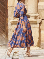 Aroha - Abstract Print Belted Midi Dress